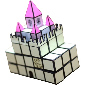 A 3x3x3 with many extensions transforming it into an elaborate Castle.